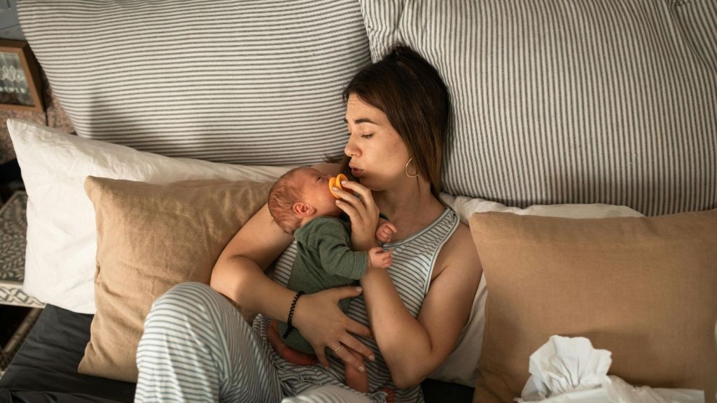 A woman with a newborn