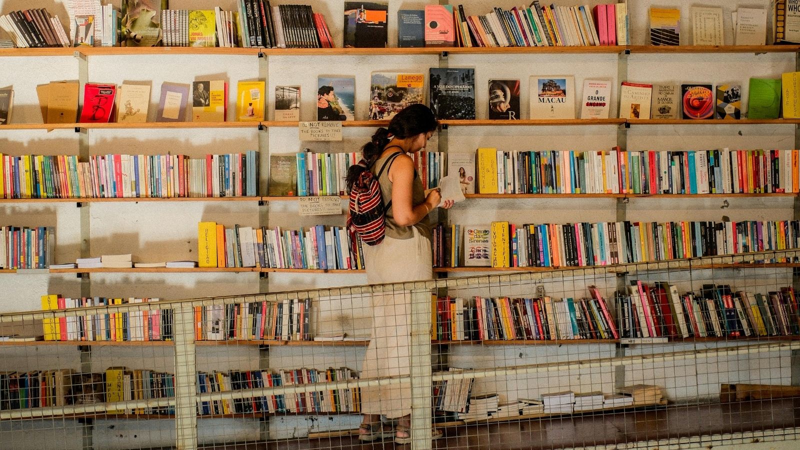 A woman browsing a book store