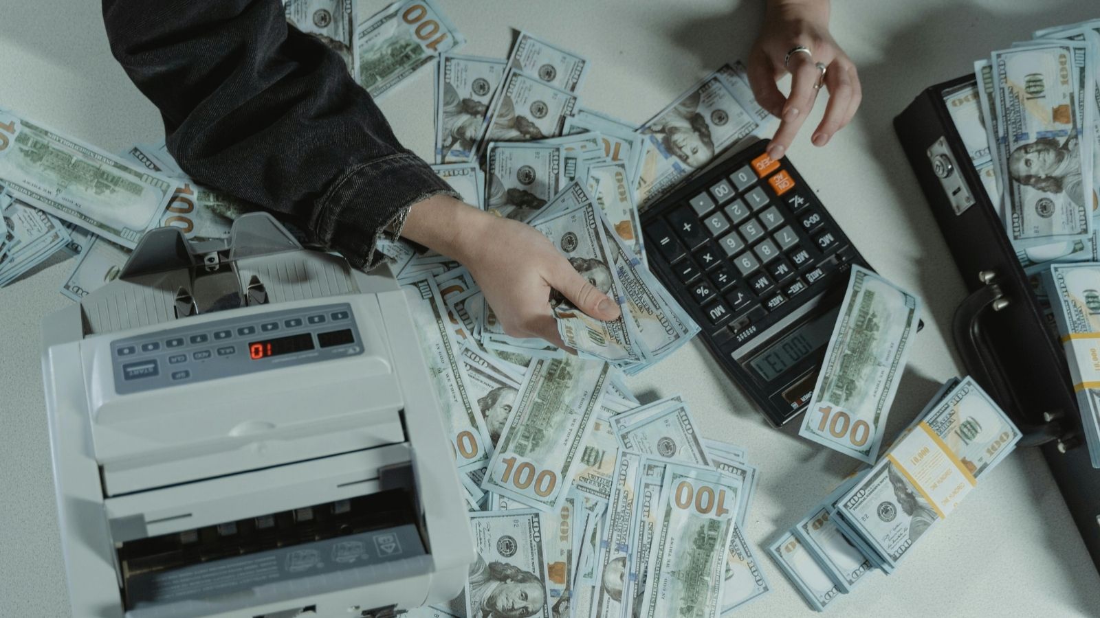 Counting cash with a calculator
