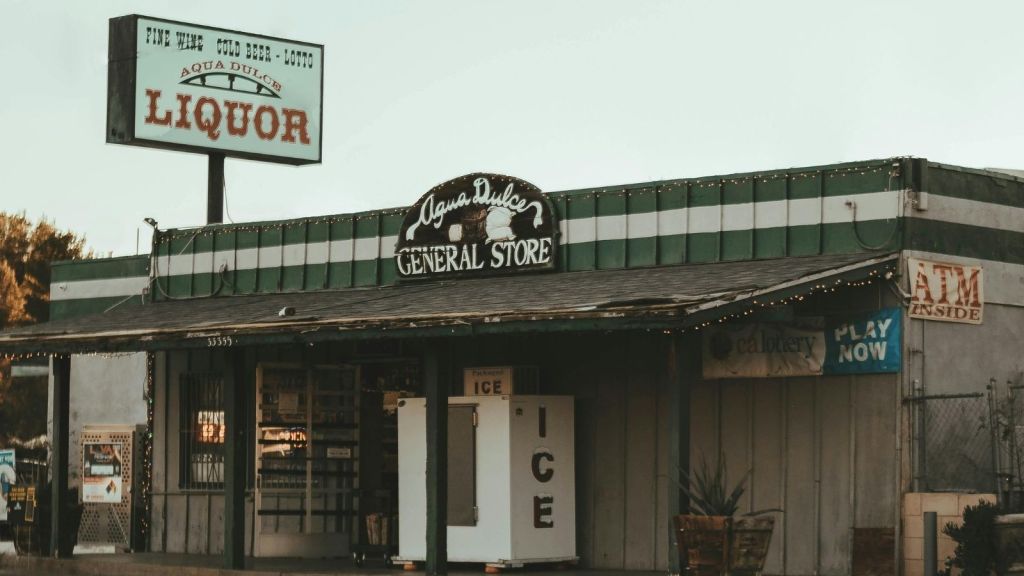 General store with large liquor sign