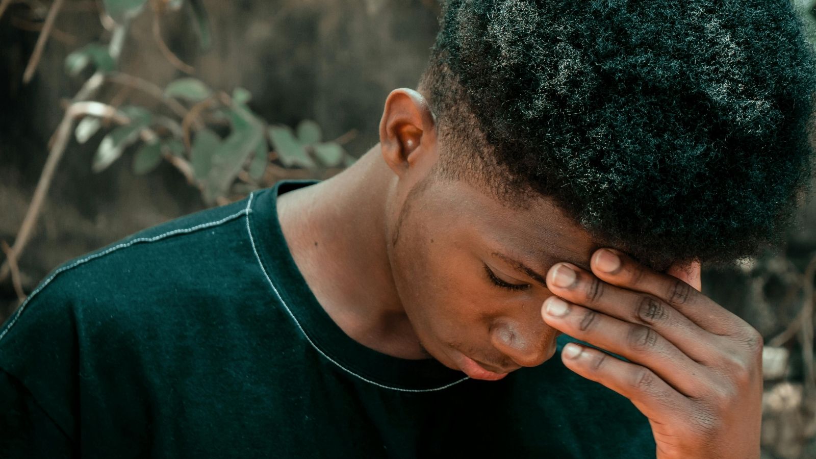 Grieving Son Struggles to Accept Stepmom After Father Moves On Quickly, Causing Family Tension A teen boy looking upset