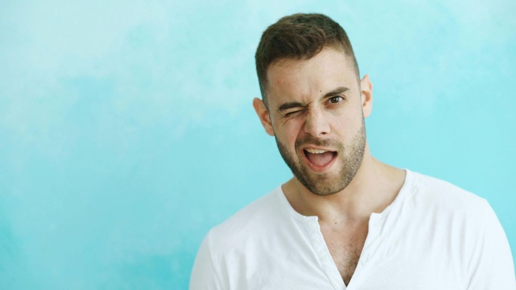 A guy winking
