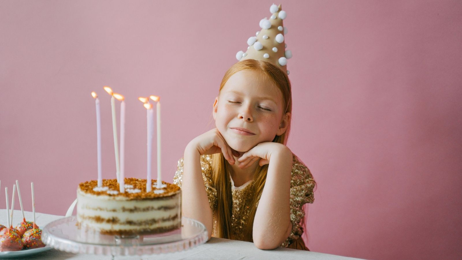 A girl with her birthday cake