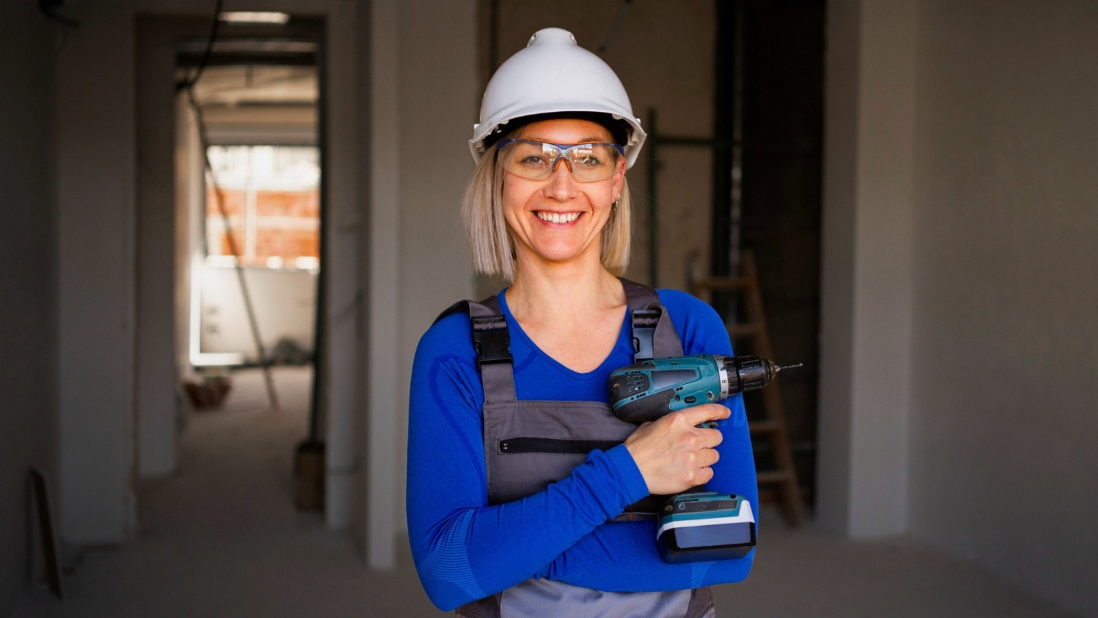 Woman holding a drill