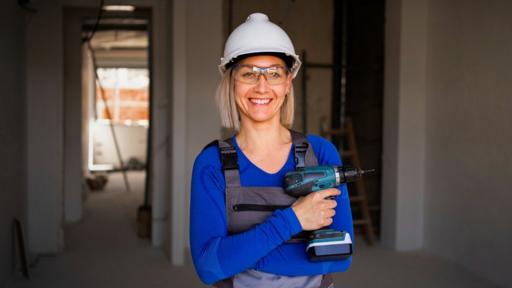 Woman holding a drill
