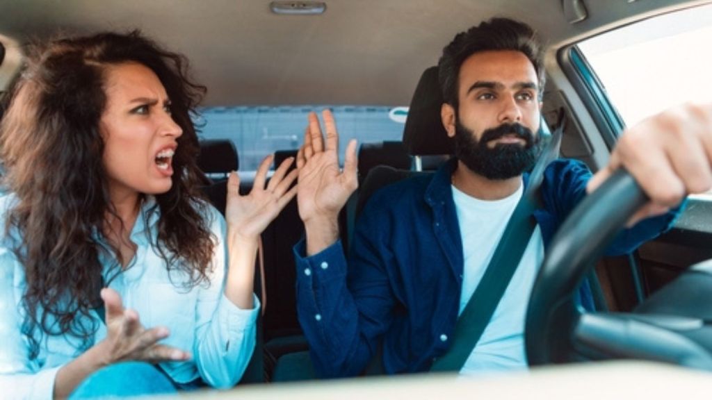 Upset woman in car