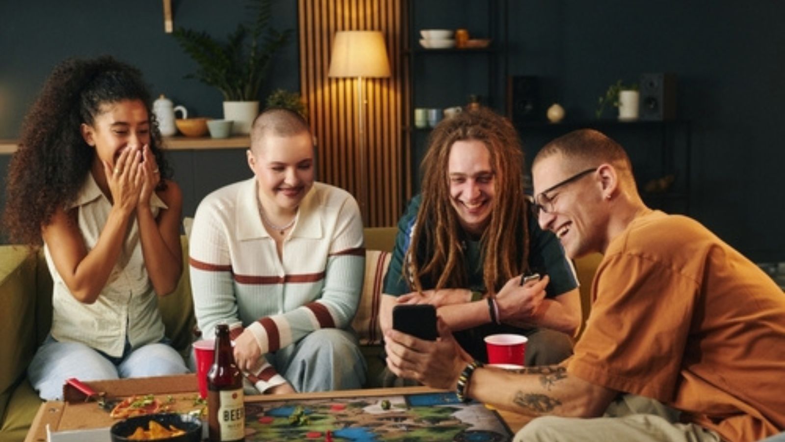 A Simple Game Night Plan Leads to Unexpected Roommate Tension Friends playing games