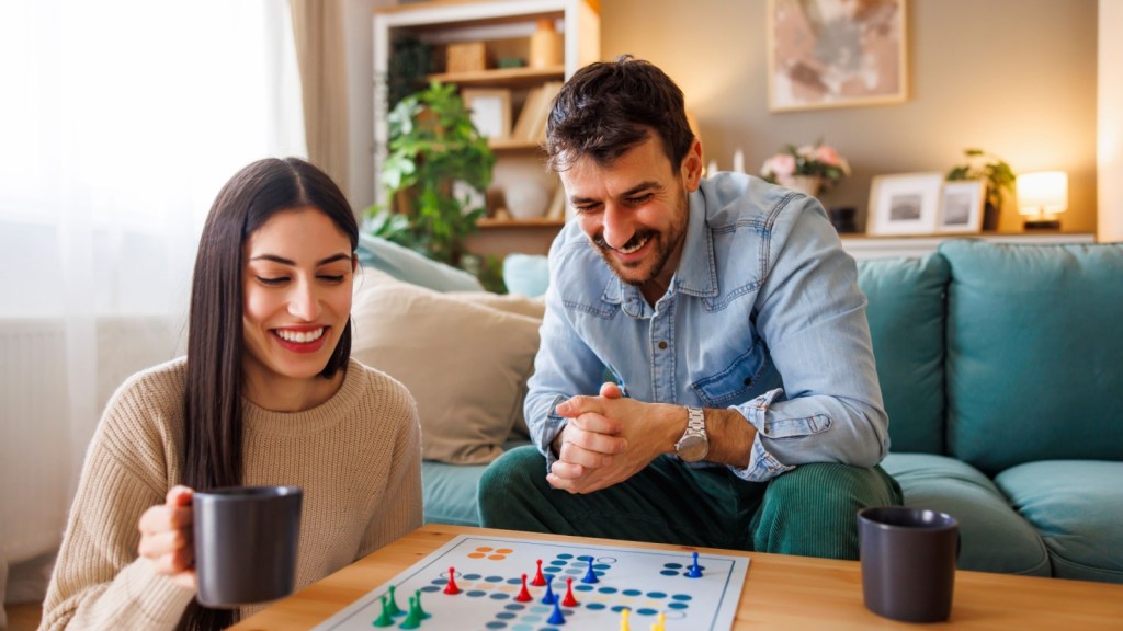 Couple playing a board game