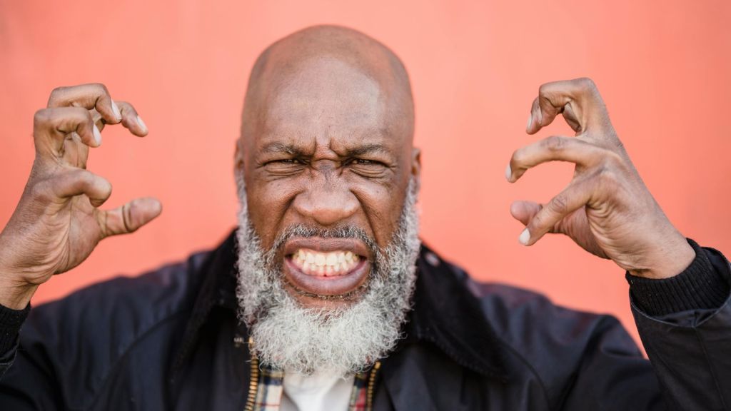 Older man looking furious