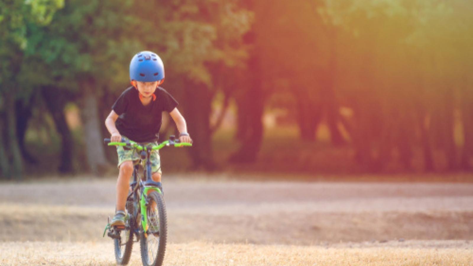Homeowner Asks Kids to Stay Out of Yard After Landscaping Damage, Neighbor Mom Gets Angry Kid riding a bike