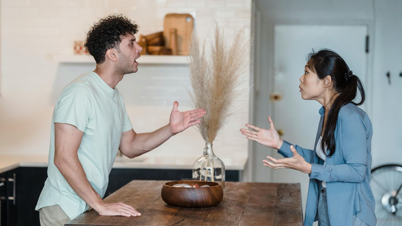Man and woman arguing at home