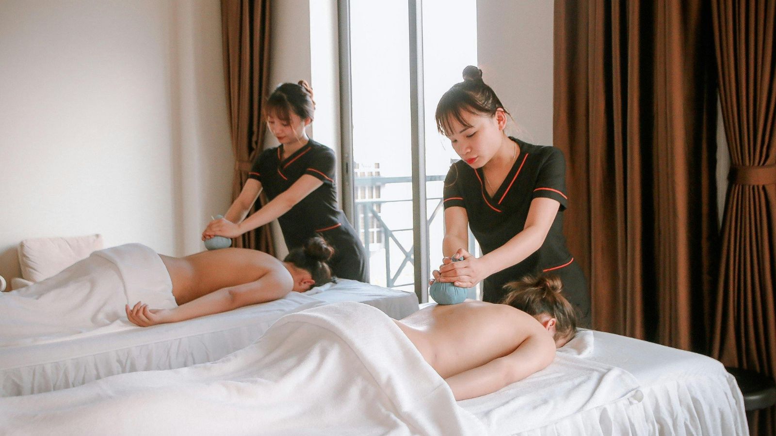 Two women getting a massage 