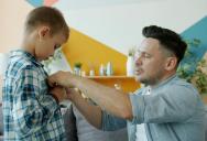 Dad Teaches Young Son Proper Way to Pay After He Excitedly Tries Buying Lunch Himself