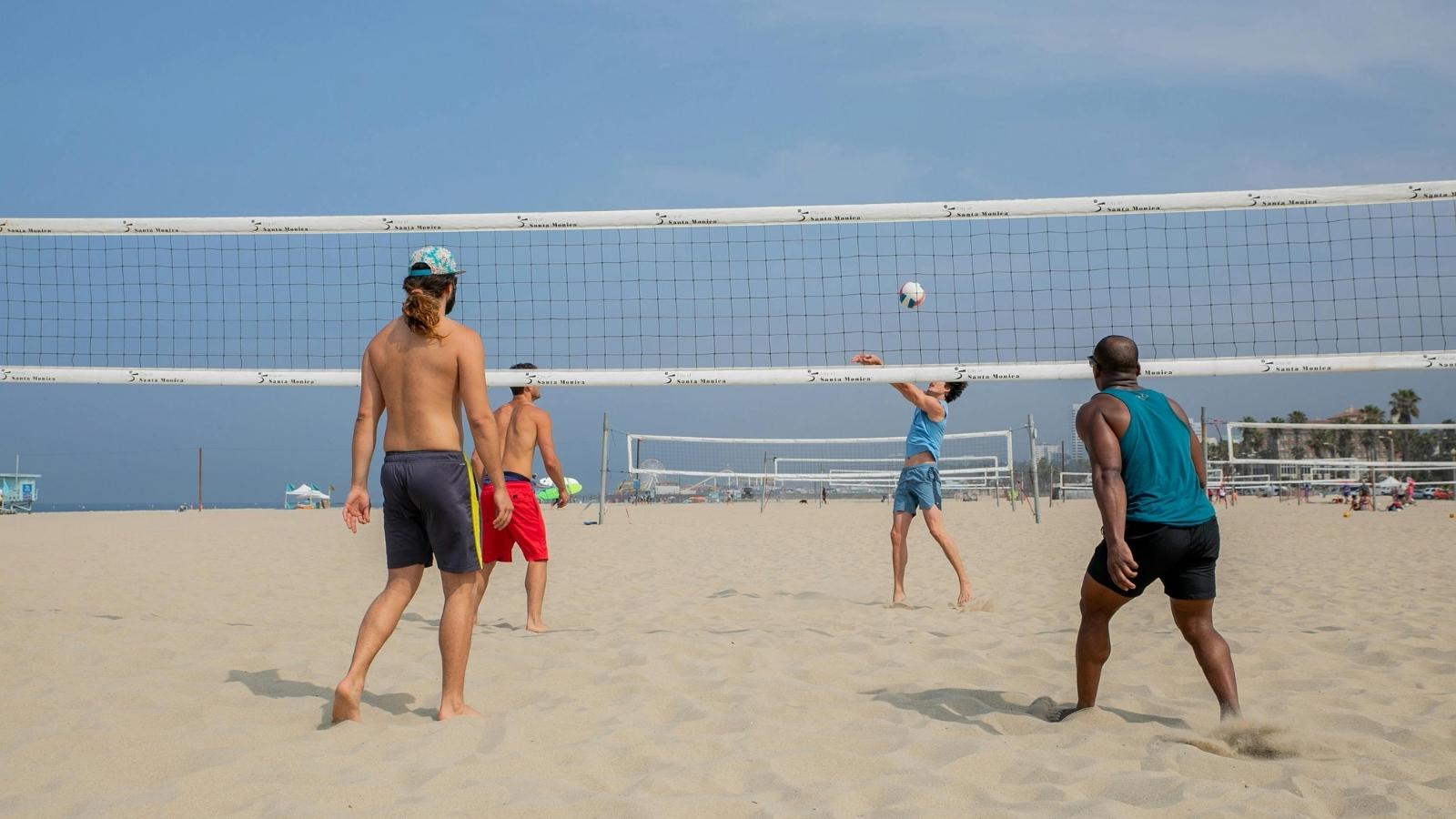 Volleyball Player Exploits Loophole in Recreational League’s “Unchangeable Roster” Rule Four people playing in a rec volleyball game