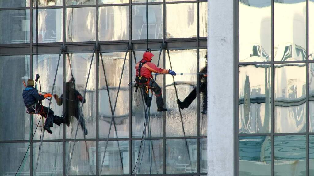 Window cleaners high up on a building