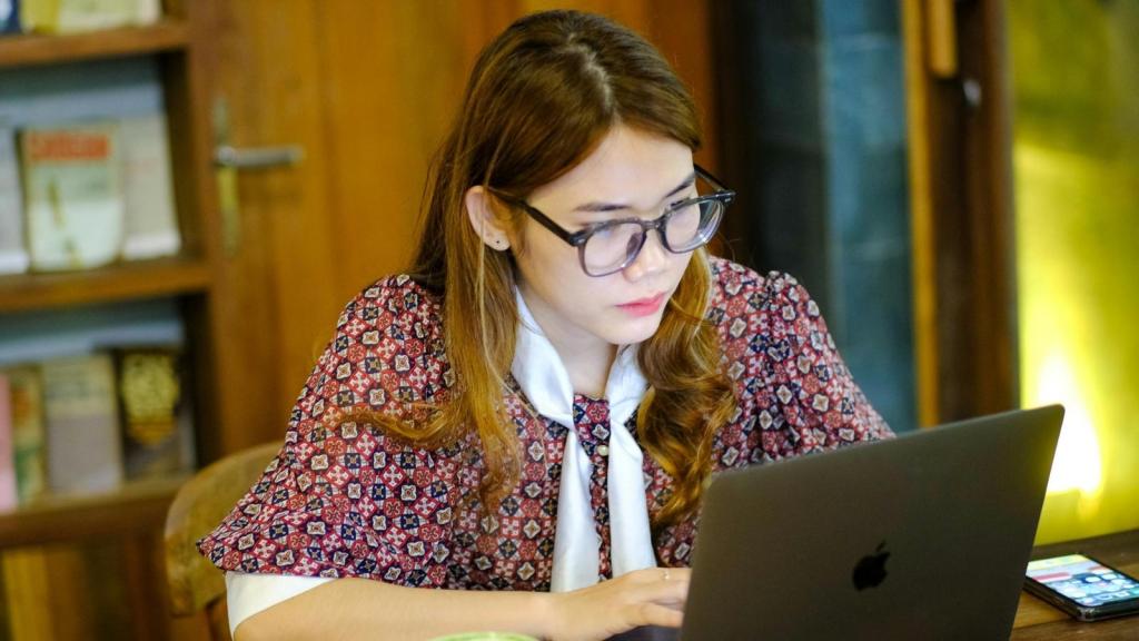 College student working on her computer