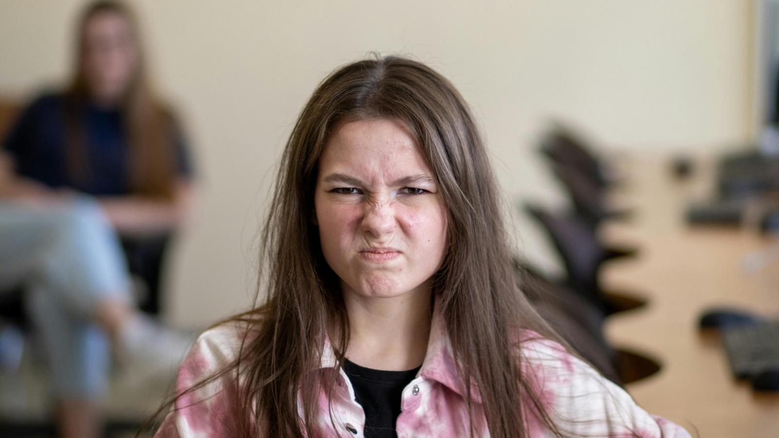 Young woman frustrated because she entered a bad deal