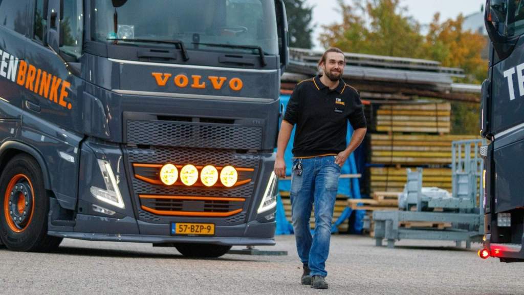 Truck driver walking away from his rig at a weigh station