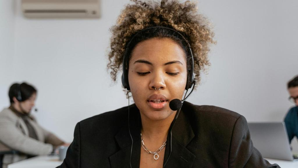 Call center working trying to reason with a rude woman