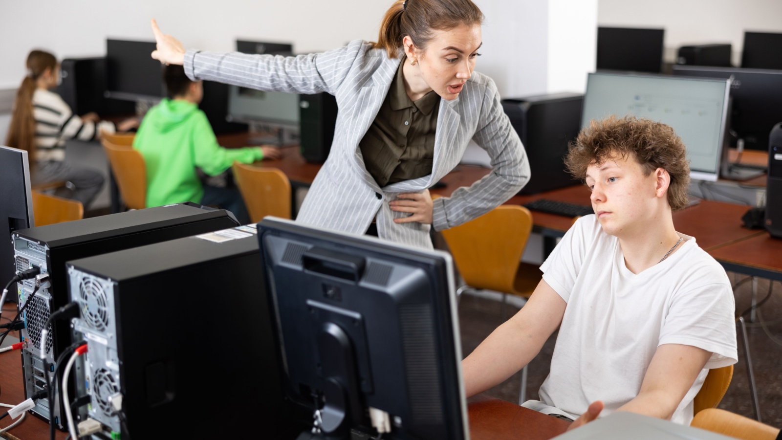 Aide yelling at student