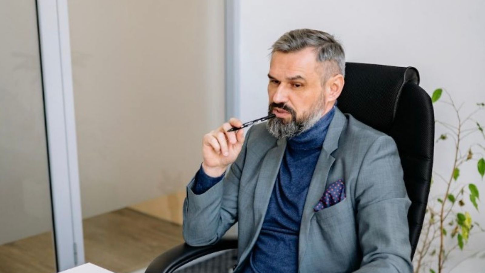 older businessman at his desk