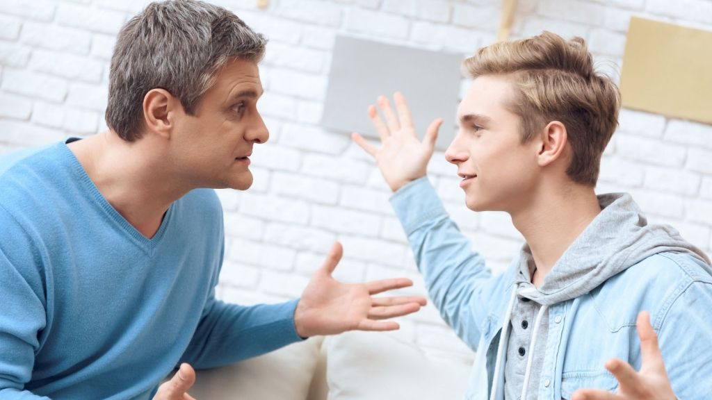 teenage boy arguing with dad