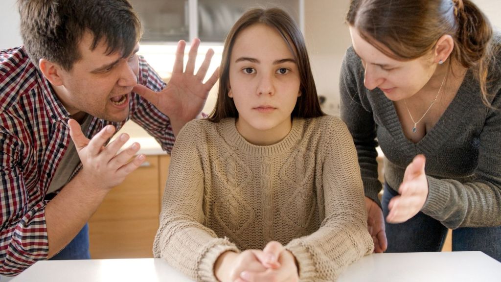 parents yelling at teenage girl