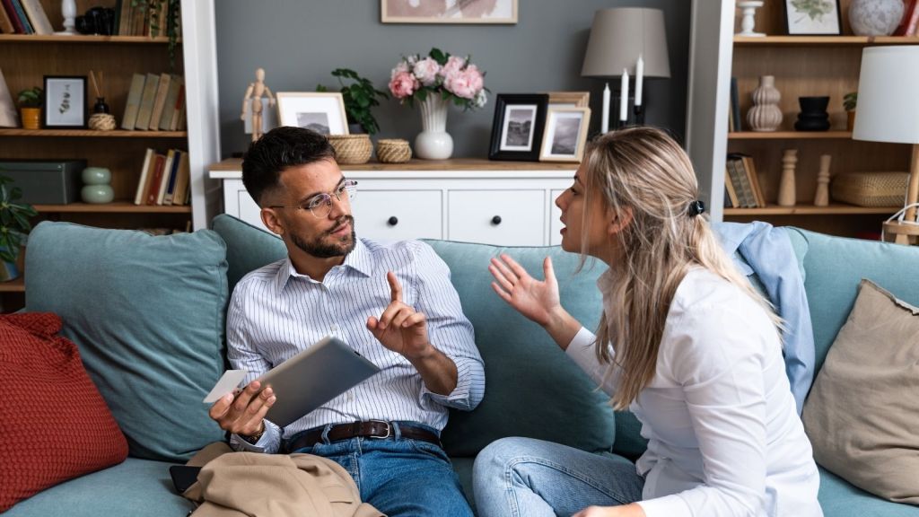 wife yelling at defensive husband