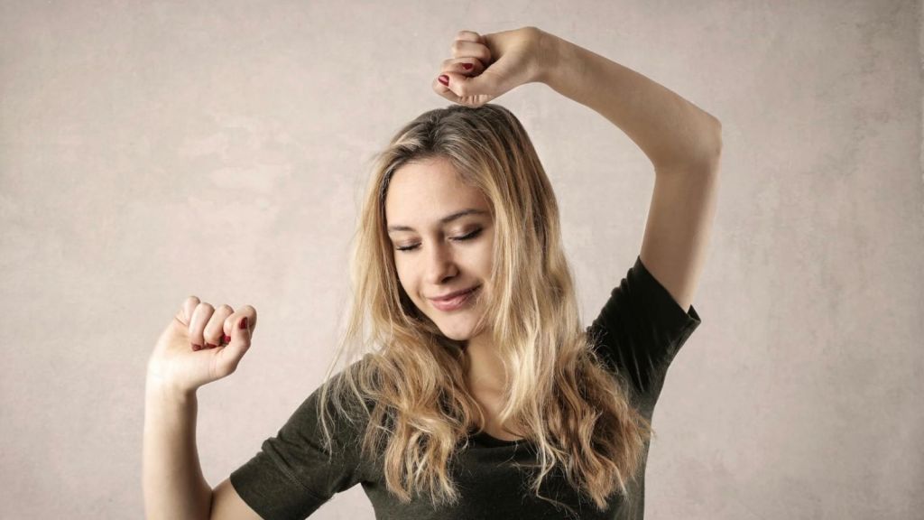woman doing a happy dance