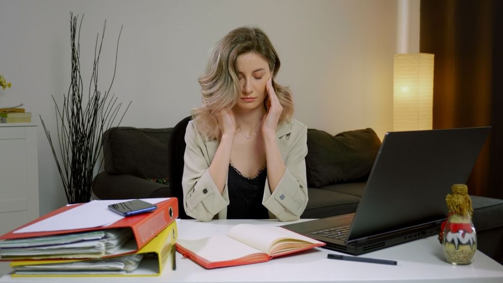 stressed out woman in an office
