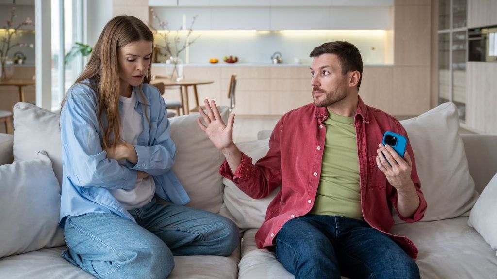 sad woman arguing with her boyfriend