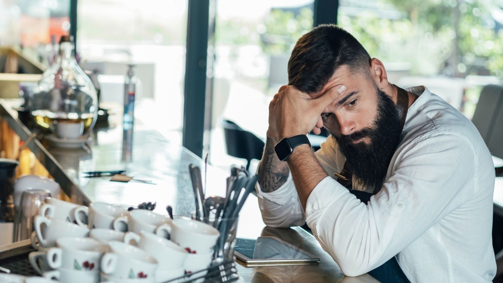 worried man working at a restaurant