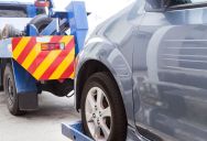 The Driveway Standoff: How a Neighbor’s Fake Moral Outrage Over a Parking Space Triggered a Costly Middle-of-the-Night Tow