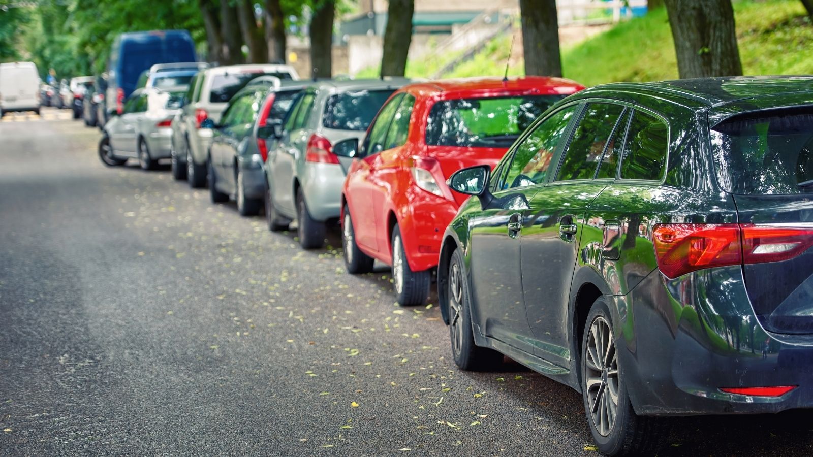 Annoying Neighbor Demands Woman Stop Parking on the Public Street—Then Faces Instant Karma After Her Request Is Granted cars parked along the side of a narrow street