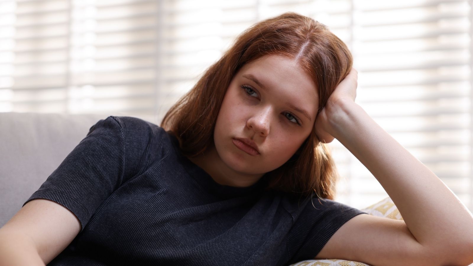 He Made a Rude Comment to His Stepdaughter, and Her Mom Insists He Should Apologize sad teenage girl