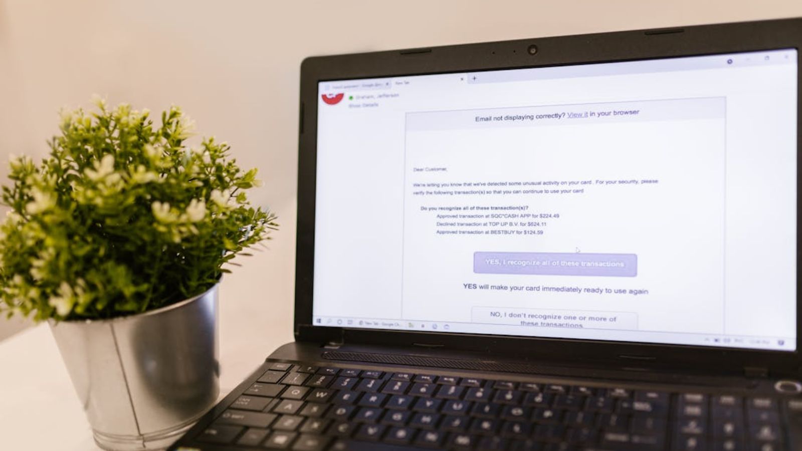 Employee Becomes Extremely Cautious After Company Warns Failed Phishing Tests Could Lead to Termination Laptop showing a phishing email on the screen