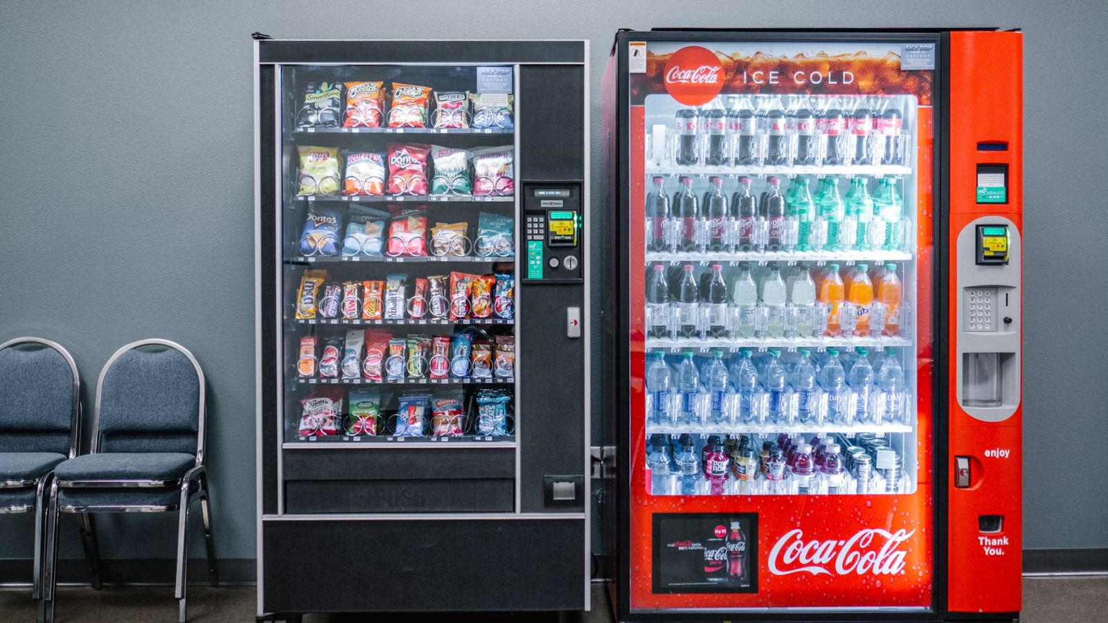 Snacks and beverage vending machines side by side