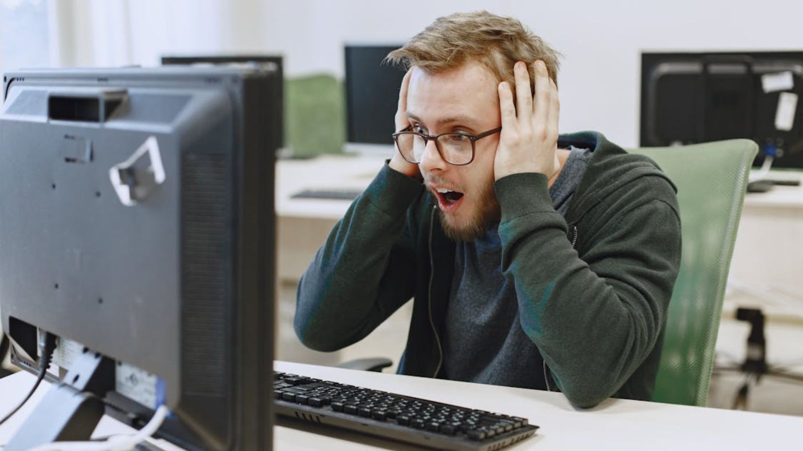 IT Worker Handed Confusing Request to Back Up Entire User Folder—Then Discovers a Web of Hidden Hazards That Stalled the System Man feeling shocked and stressed with work in the computer