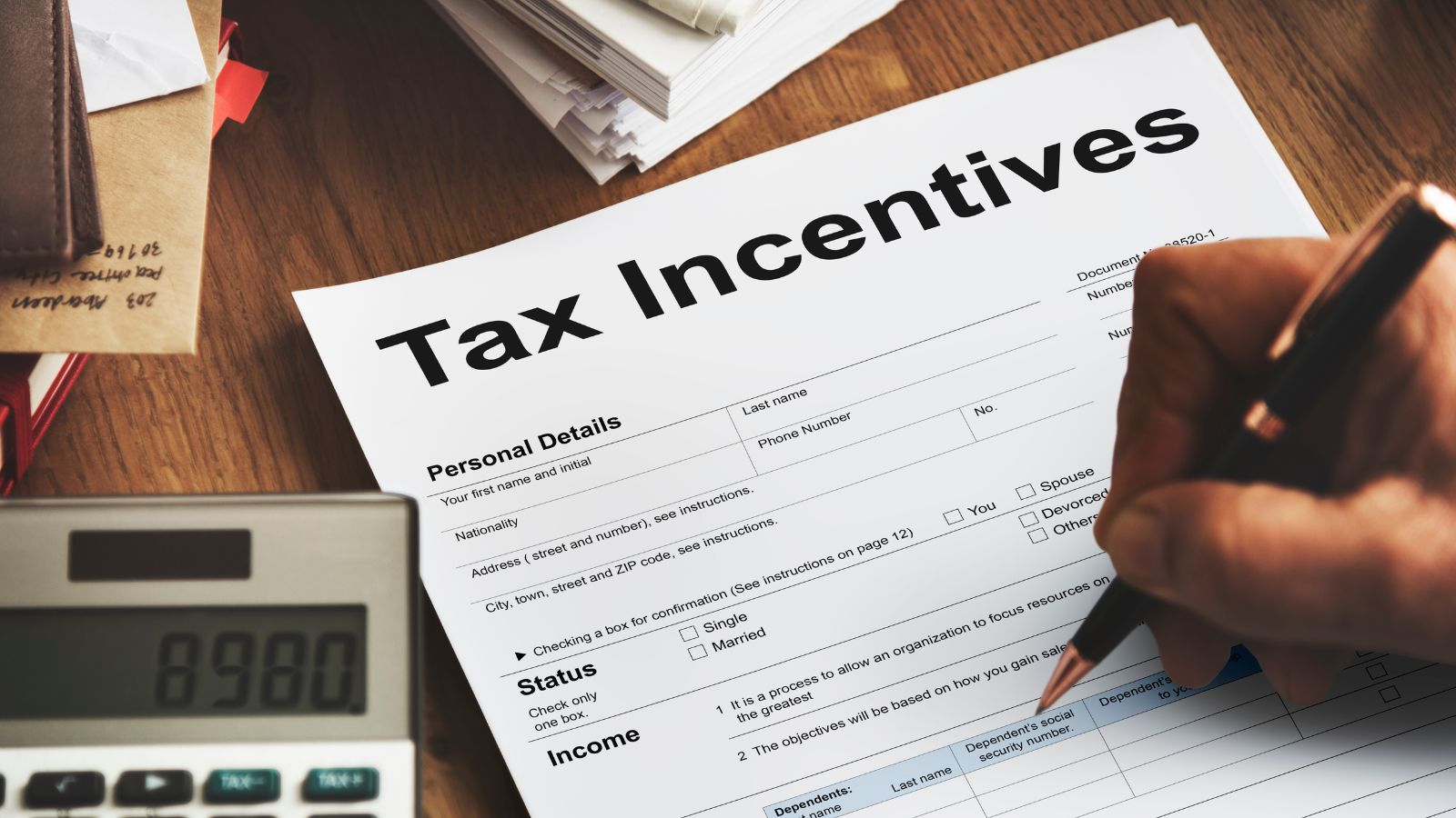 Person filling out a tax incentive form