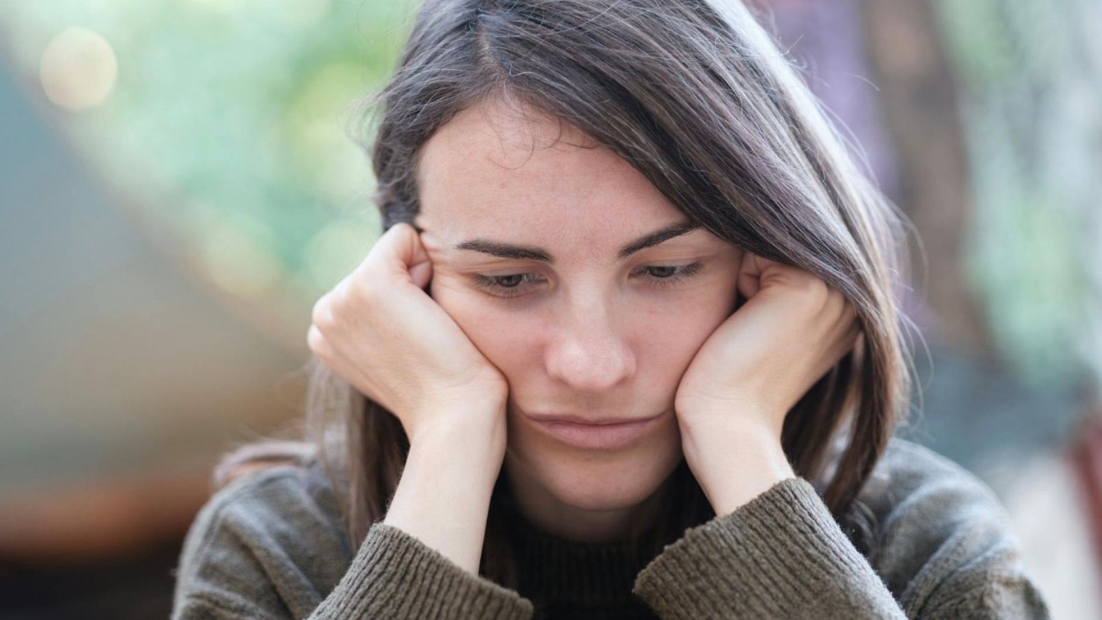 sad woman looking down