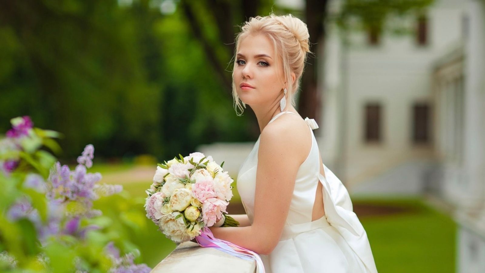 Bride Wants Father Figure to Walk Her Down the Aisle, but Her Mom Thinks It Should Be Her Uncle bride standing outside with a serious expression