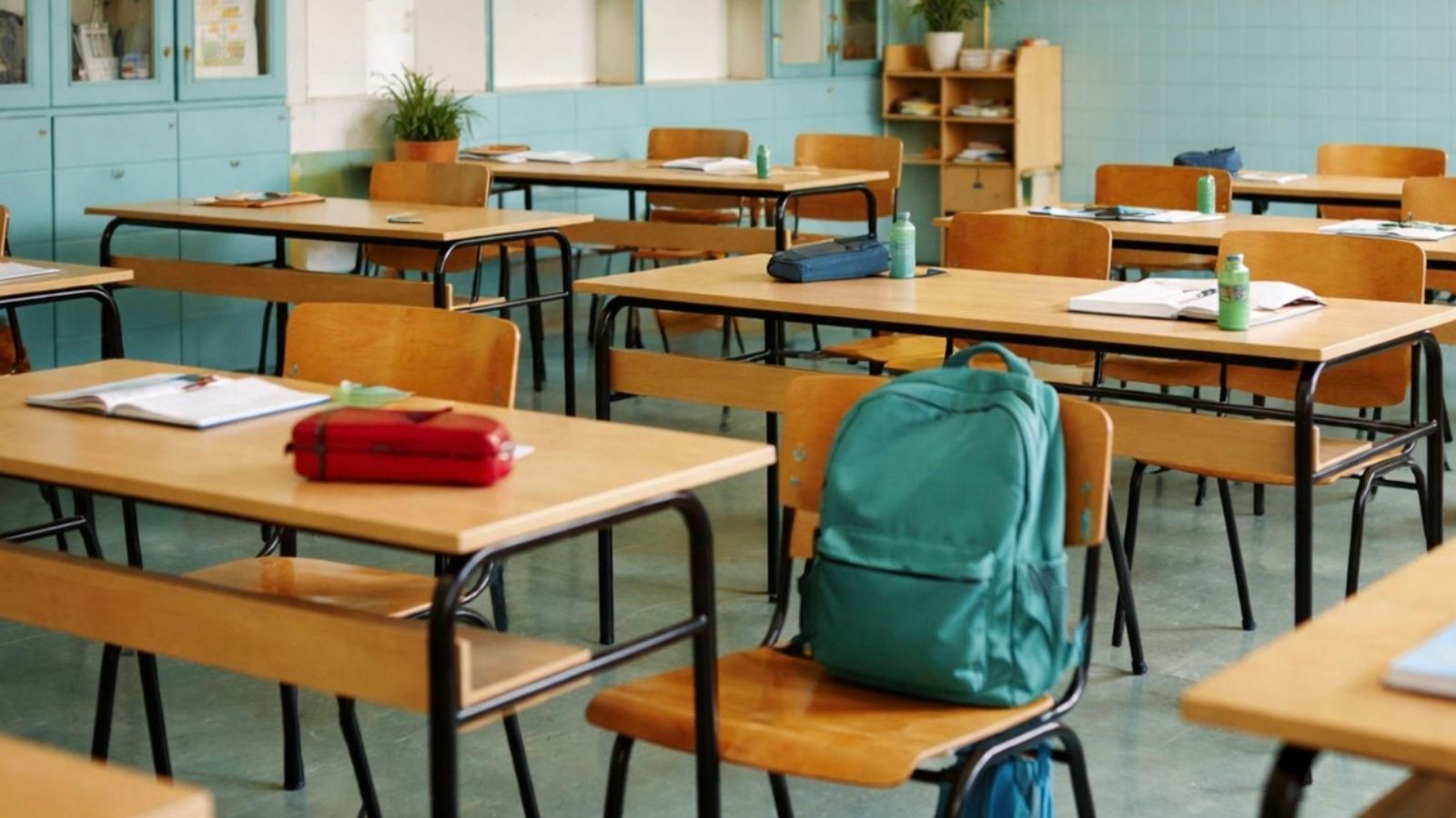 backpack on chair in empty classroom
