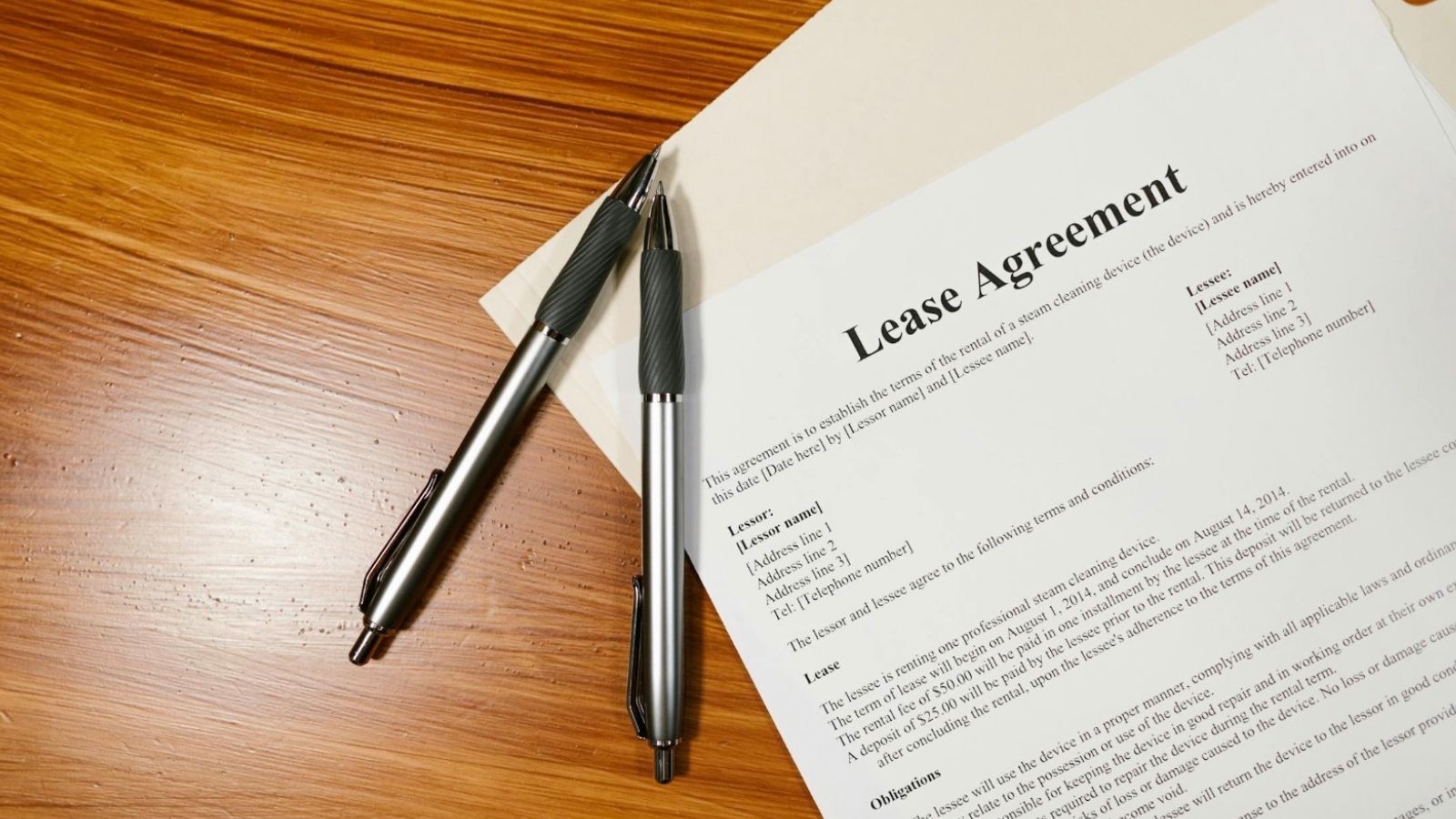 lease agreement and two pens