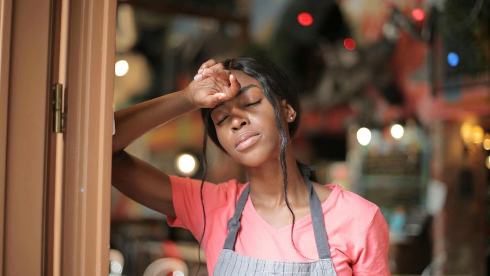 upset young woman working at a store