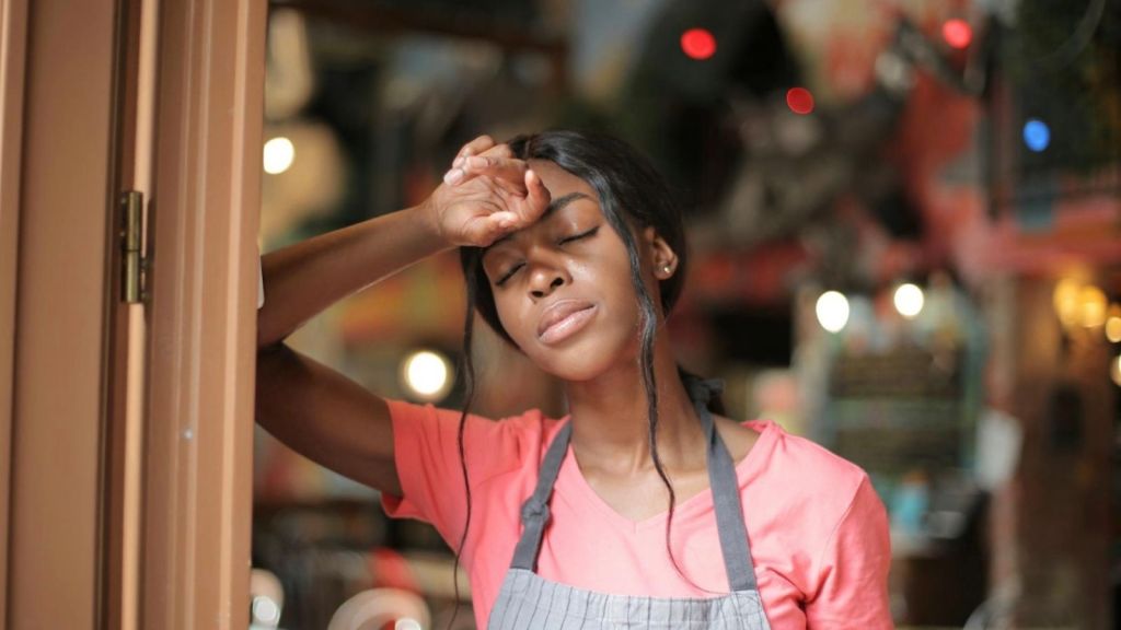 upset young woman working at a store