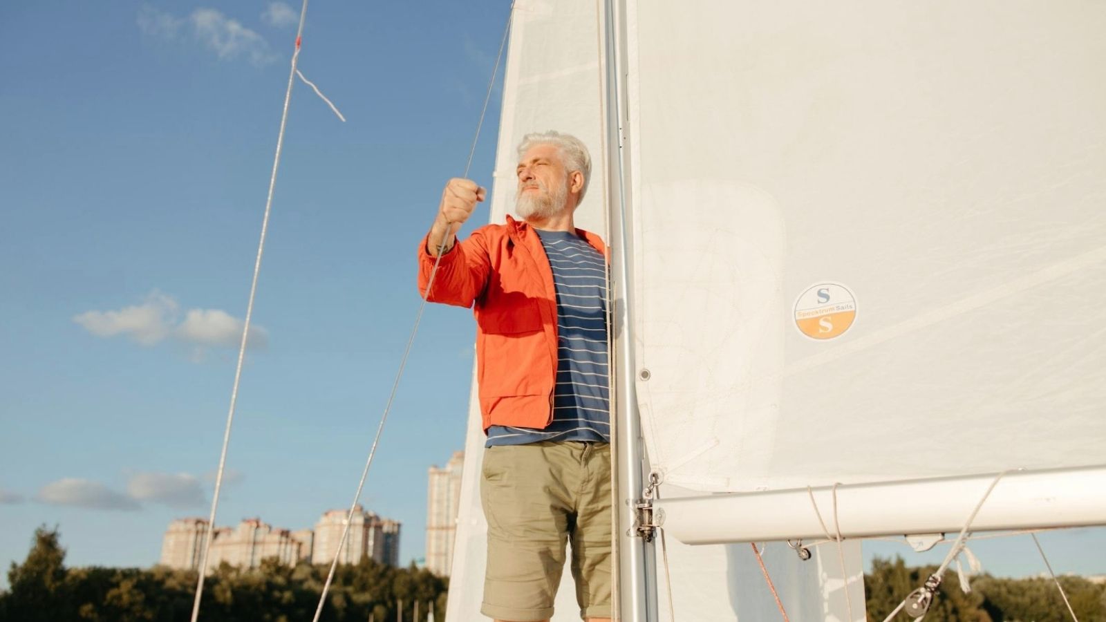 “He’s Just Disappearing:” Adult Child Blasts Father Who Is Quietly Planning to Sail Away and Never Come Back older man on a sailboat