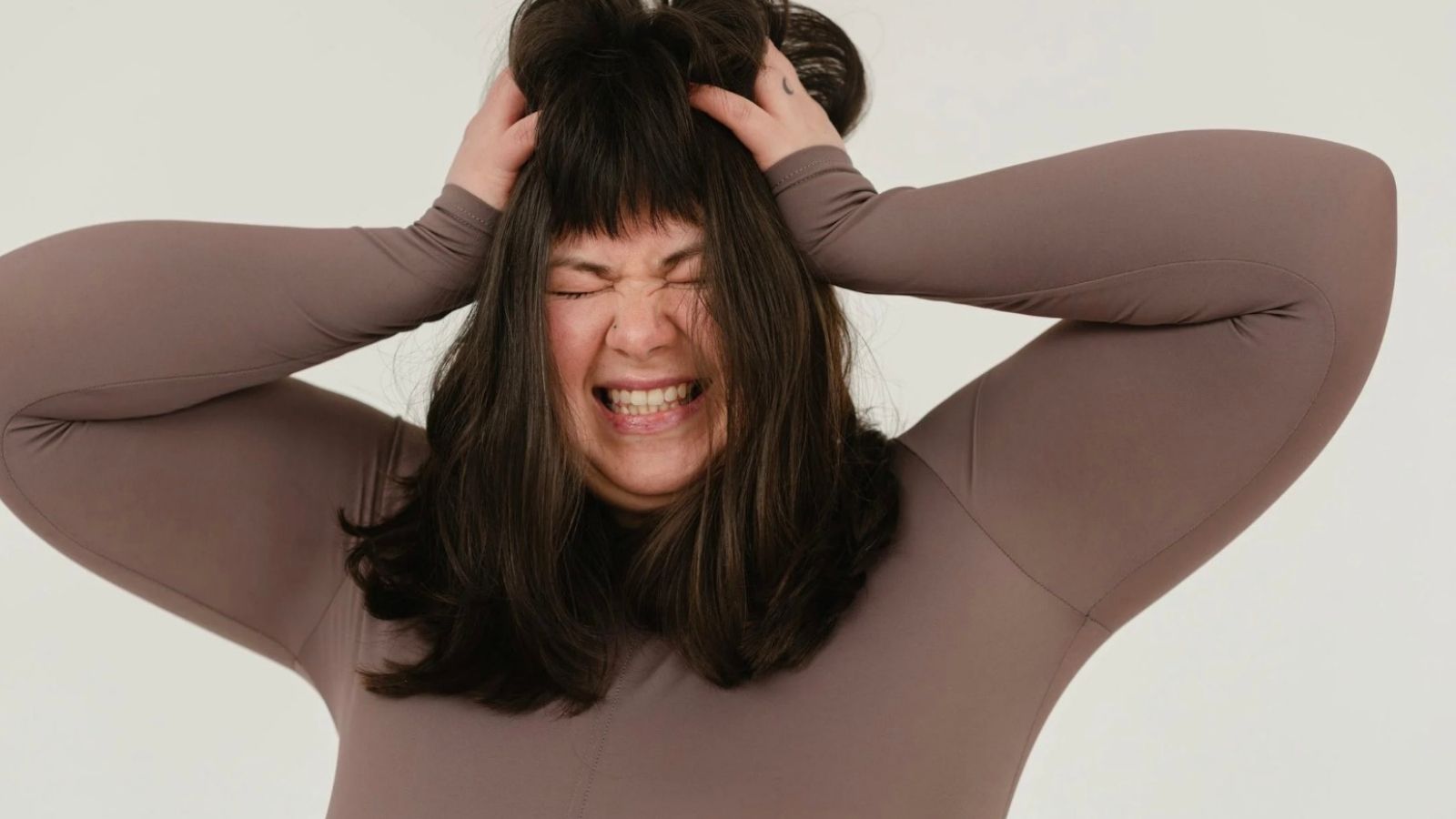 overweight stressed out young woman