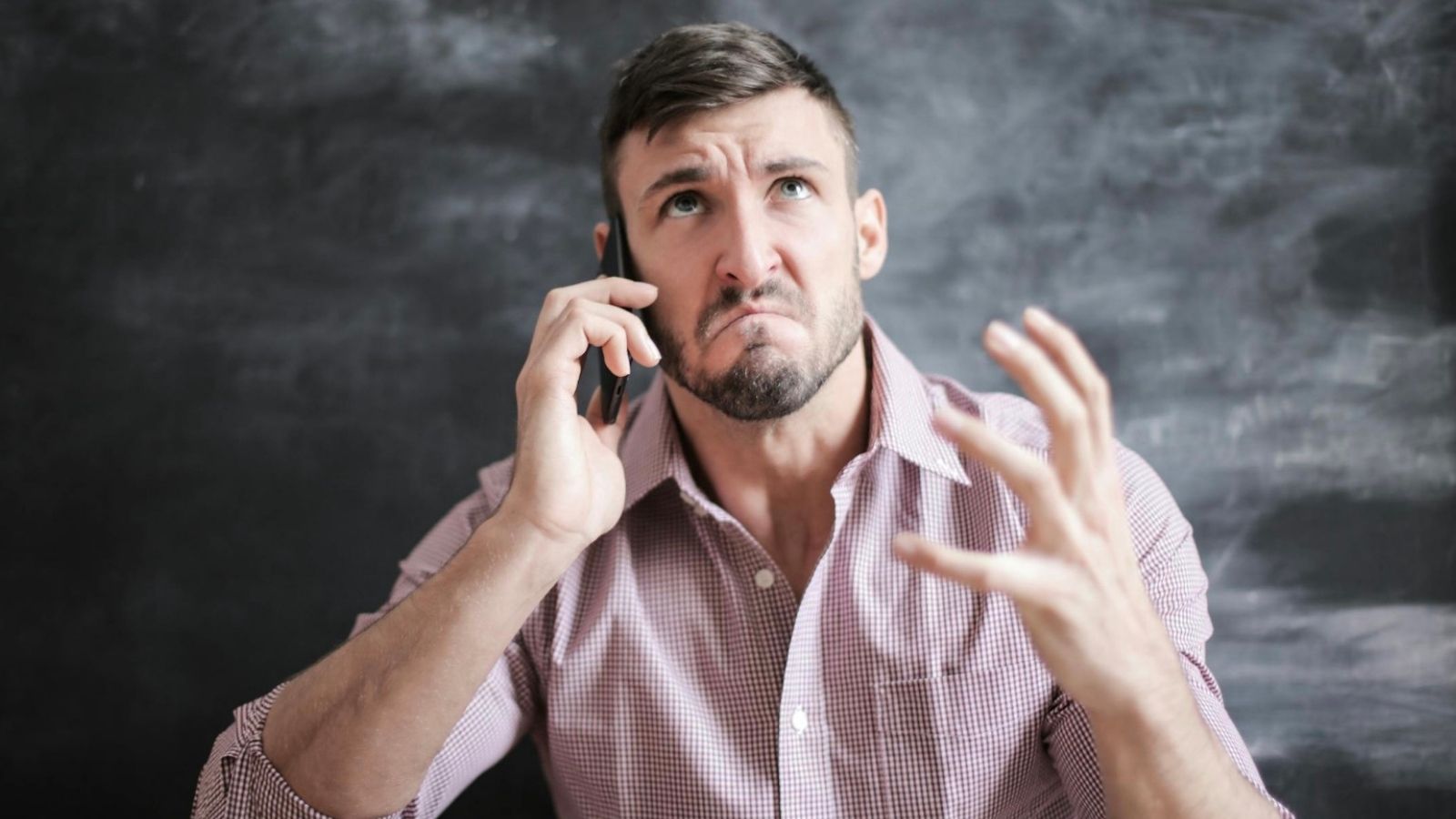 The Caregivers Emancipation: Why One Young Man Refused to Fund His Father’s New Lifestyle with a Live In Girlfriend stressed out man talking on the phone