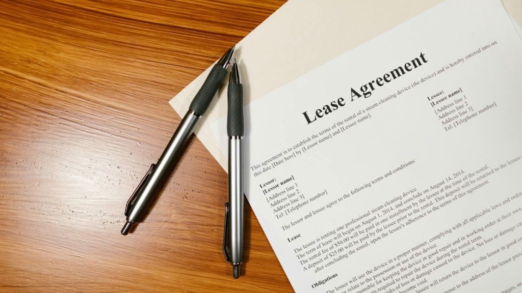 lease agreement and two pens