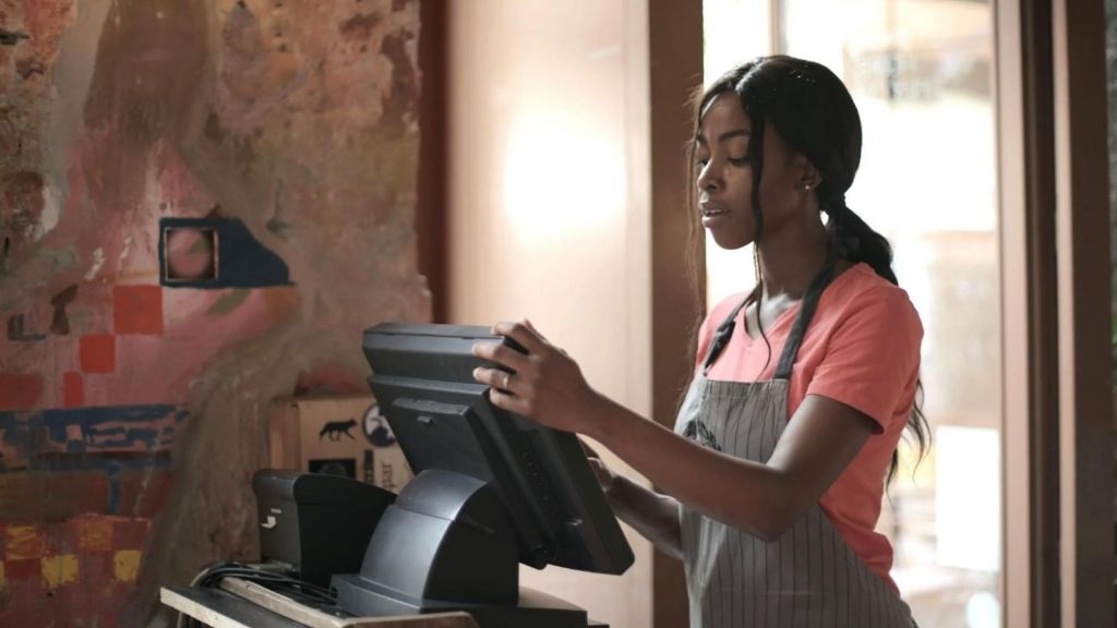 woman at a cash register